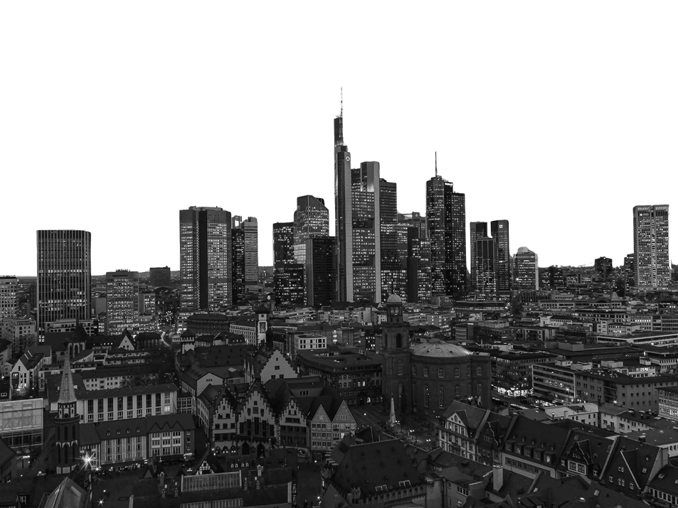 Black and white city skyline featuring a cluster of modern skyscrapers behind older, traditional buildings at dusk.